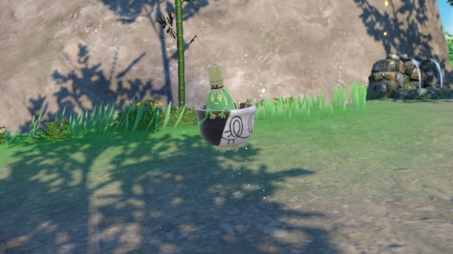 1695134700 91 Toutes les references au folklore japonais dans Pokemon Ecarlate amp Une capture d’écran de Sinistcha évoluant dans Pokémon Écarlate et Violet: Le masque sarcelle.