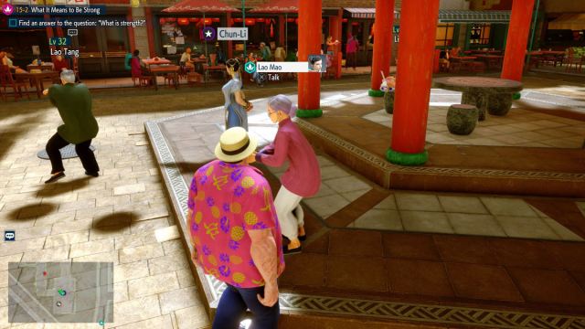 1696264604 49 Comment debloquer le costume 2 dAKI dans Street Fighter 6 Une capture d’écran de Street Fighter 6 World Tour de la joueuse debout juste à côté de Lao Mao, dont le nom est au-dessus de sa tête. L’emplacement de la carte est affiché dans le coin inférieur gauche de l’écran.